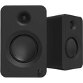 Kanto Audio Ren active bookshelf speakers with sleek black finish and modern design, showcasing front grille and speaker drivers.