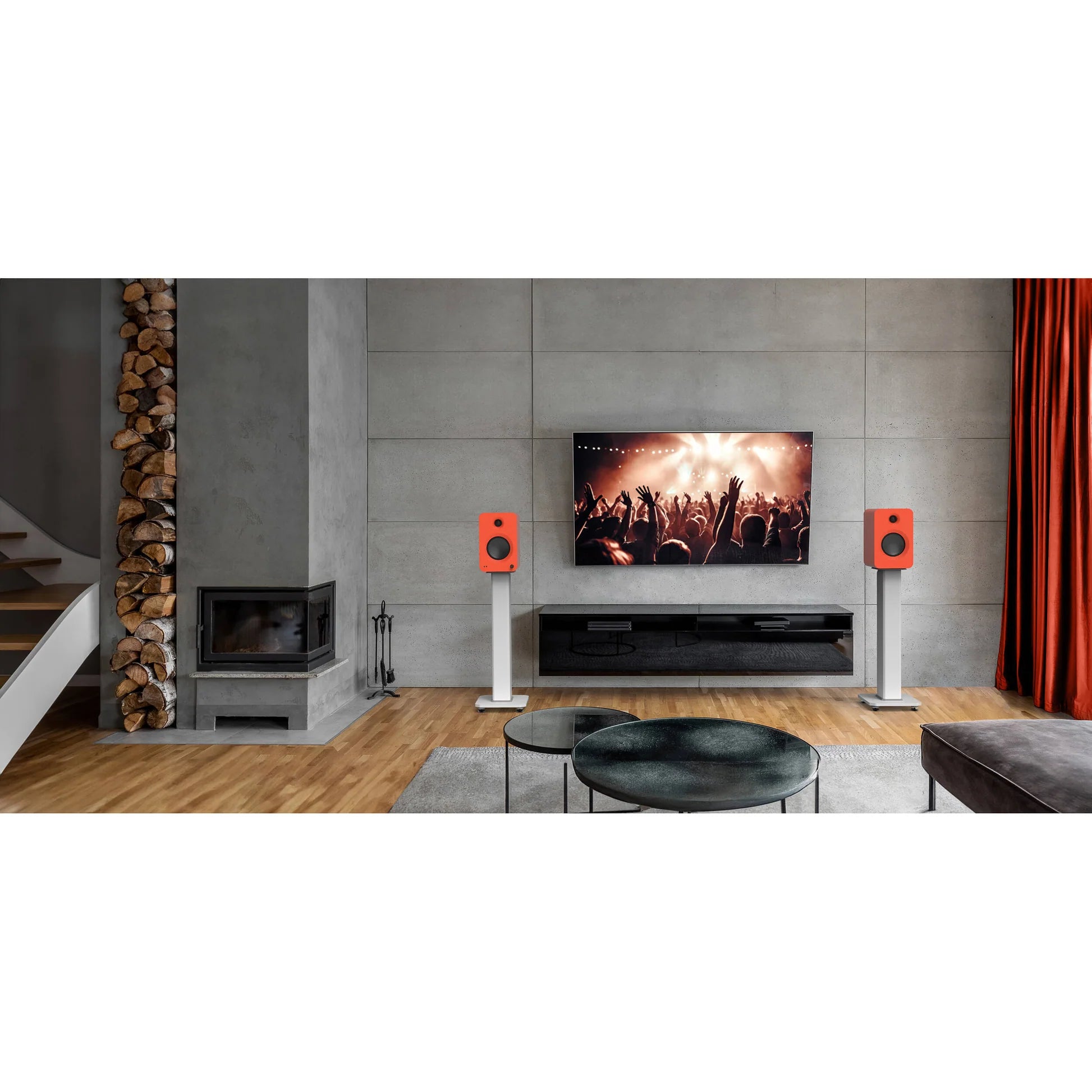 Kanto Audio Ren active bookshelf speakers with sleek black finish and modern design, showing the front view of the speakers.