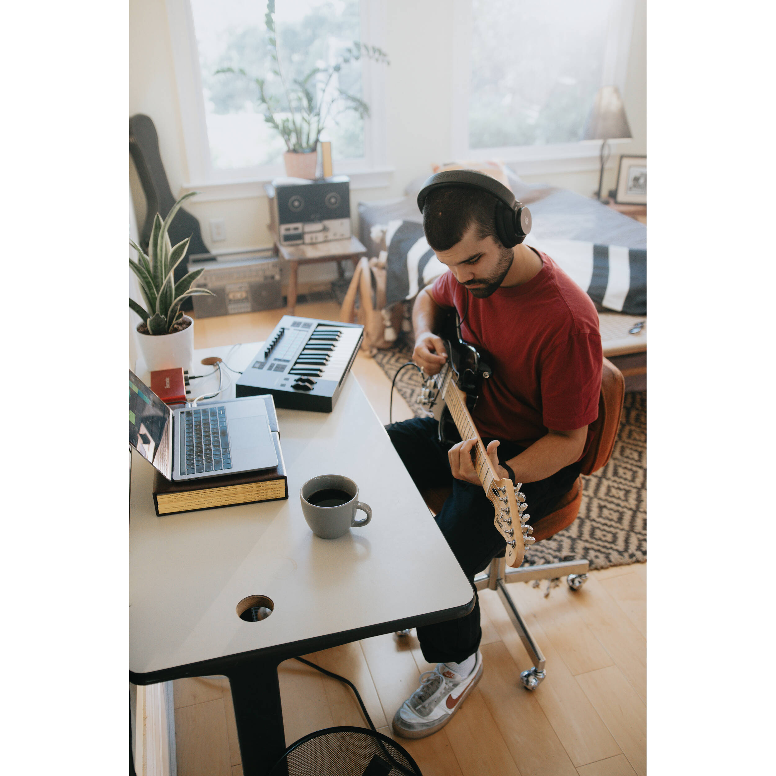 Adam Audio H200 studio headphones with over-ear design and adjustable headband, suitable for professional audio monitoring.