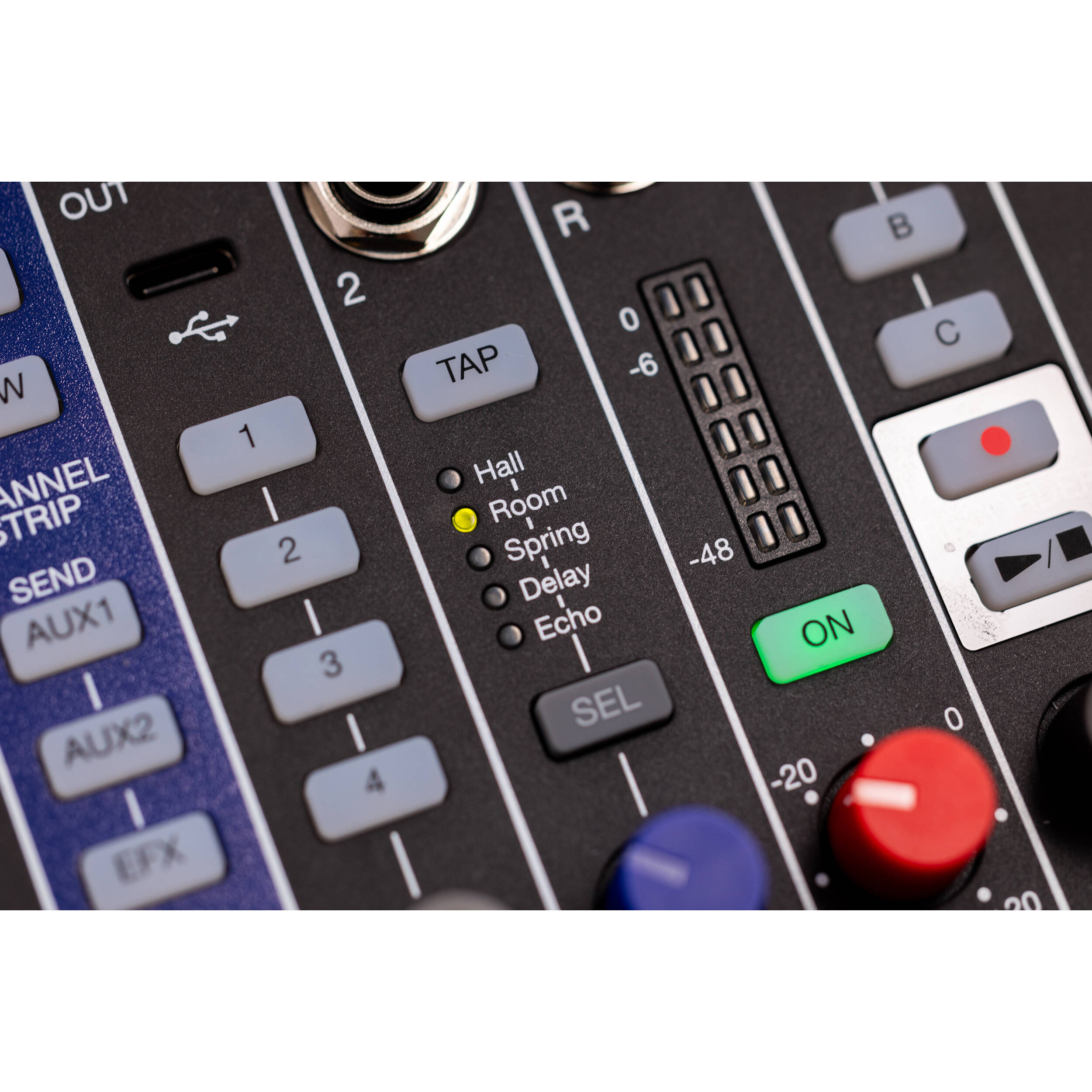 Zoom LiveTrak L-6 digital mixer with multiple input channels and control knobs, ideal for live sound and recording setups.