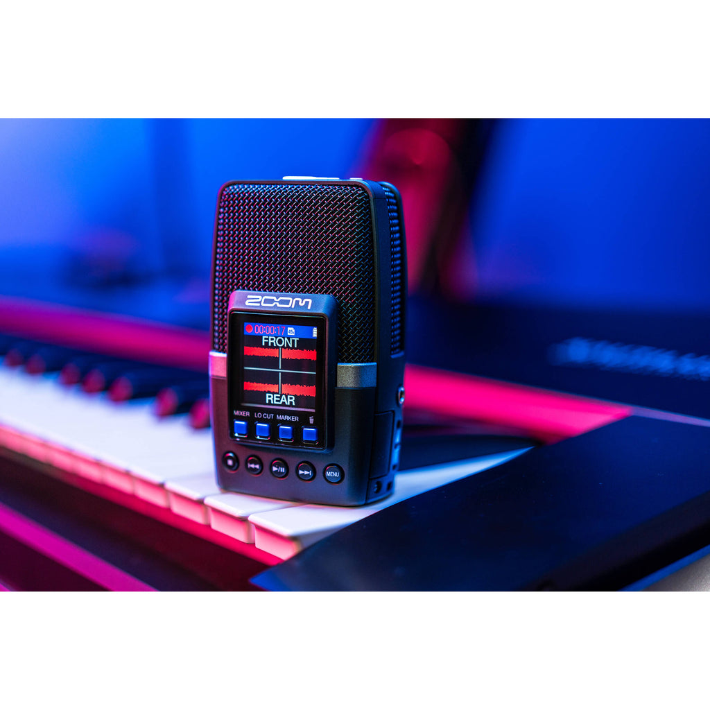 Zoom H2 Essential digital recorder with multiple microphones and control buttons, ideal for high-quality audio recording.