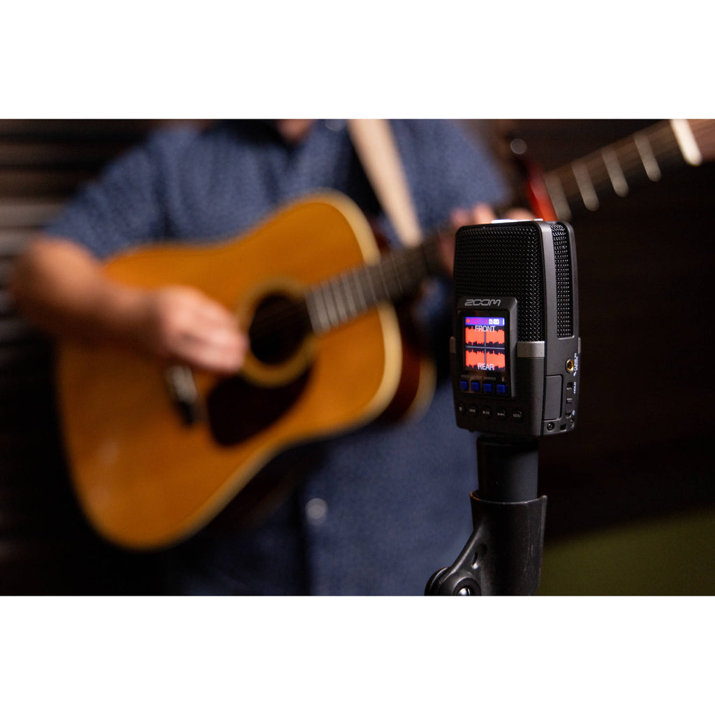 Zoom H2essential digital recorder with multiple microphones and control buttons, ideal for high-quality audio recording.