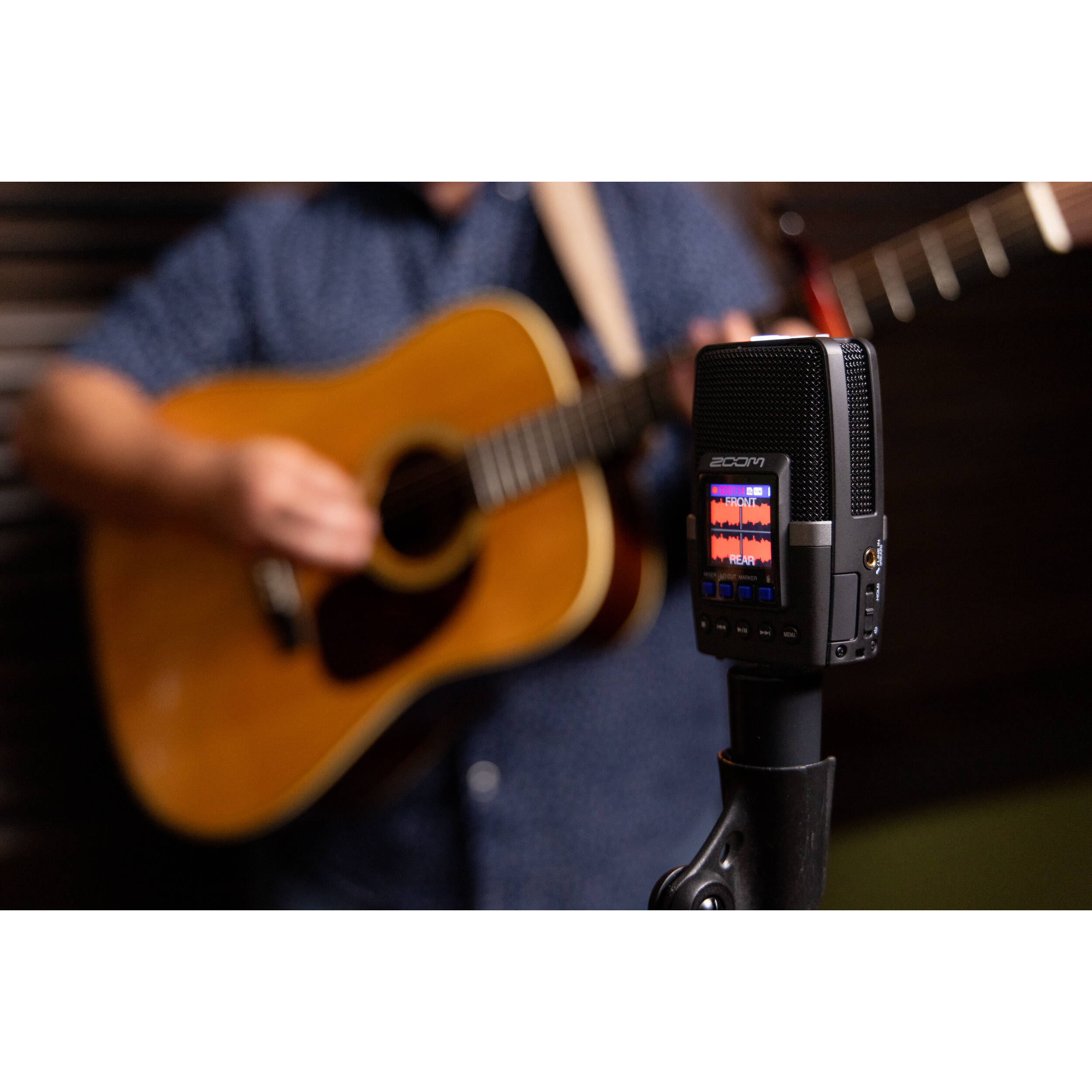 Zoom H2essential digital recorder with multiple microphones and control buttons, ideal for high-quality audio recording.