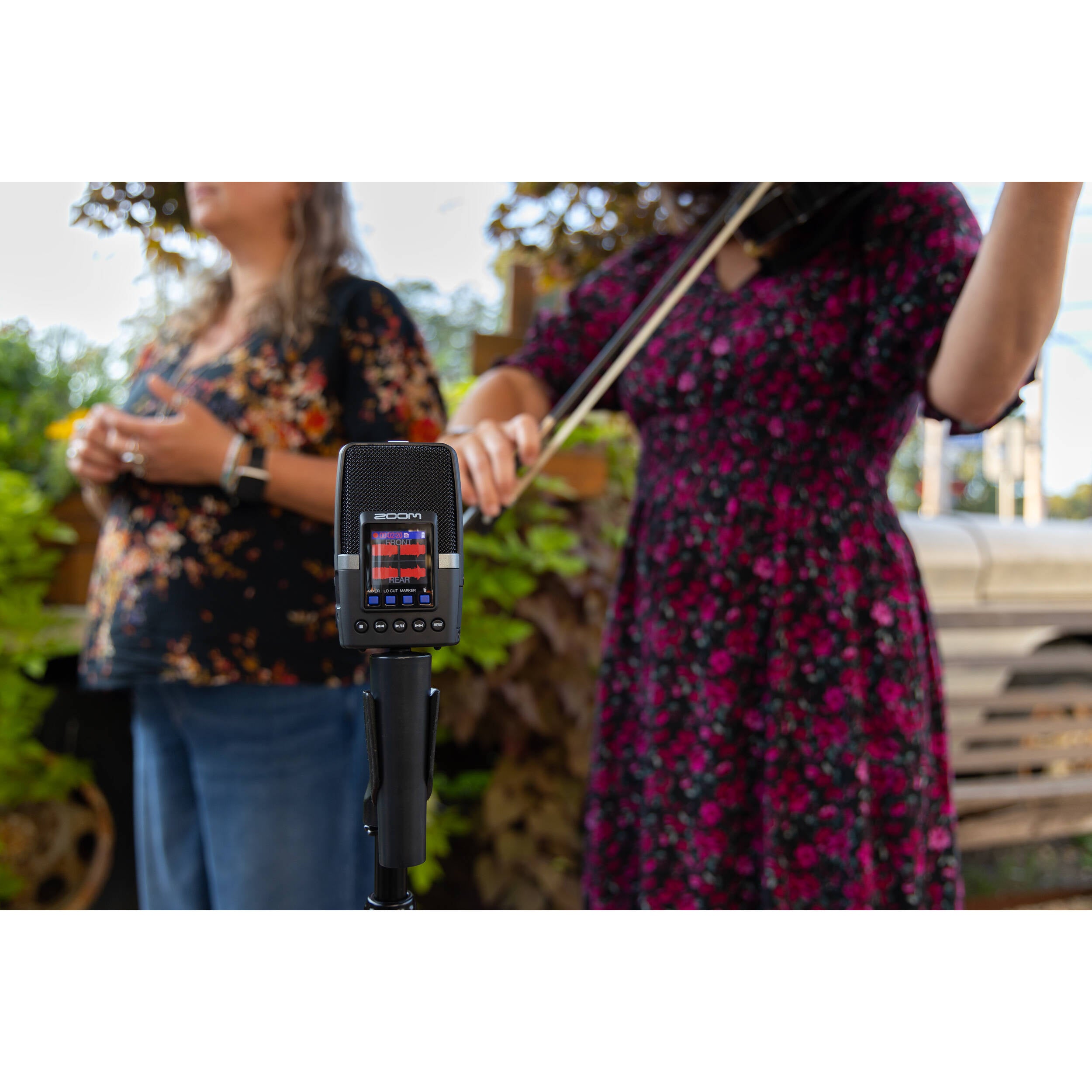 Zoom H2 Essential digital recorder with multiple microphones and controls, ideal for high-quality audio recording.