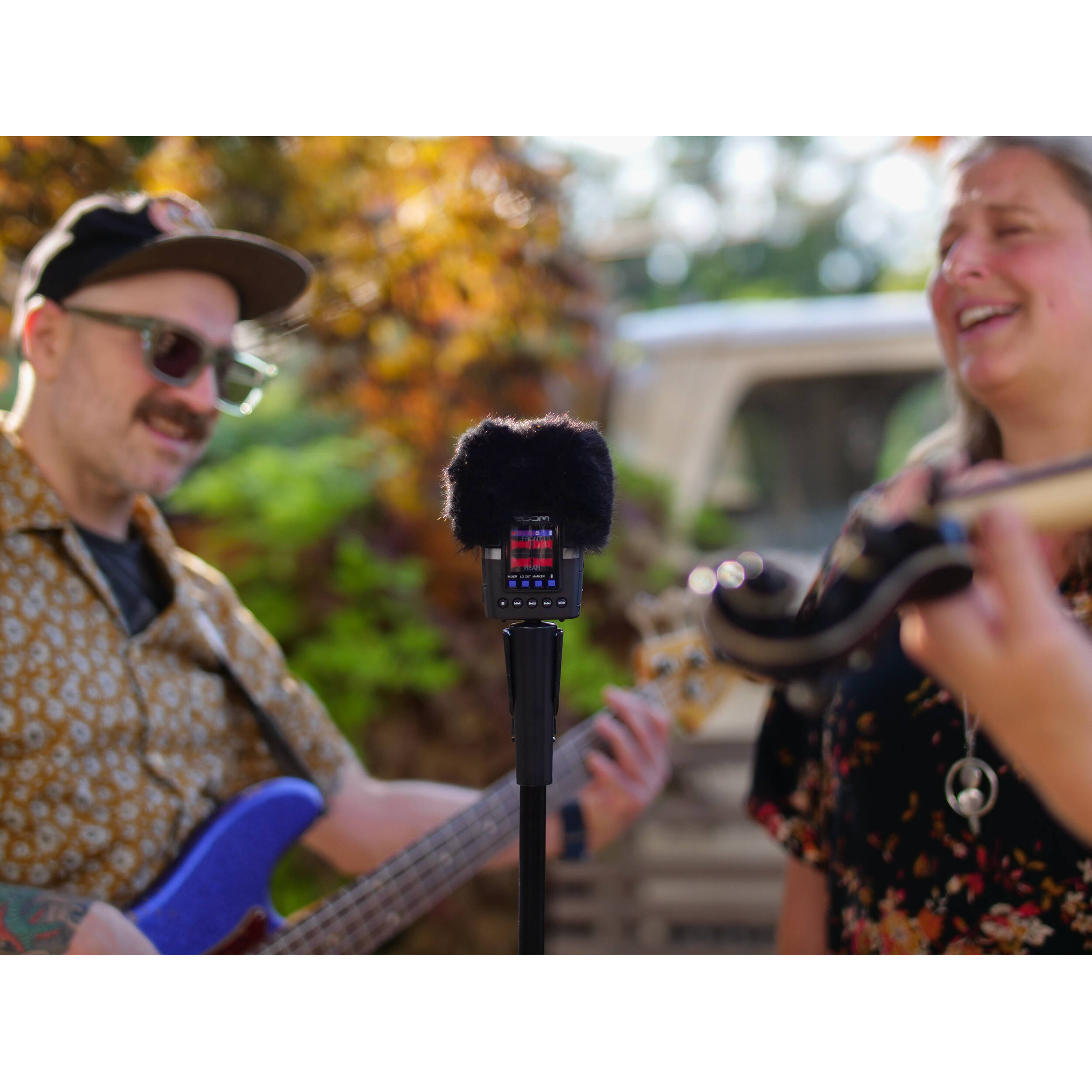 Zoom H2essential digital recorder with multiple microphones, buttons, and display screen for high-quality audio recording.