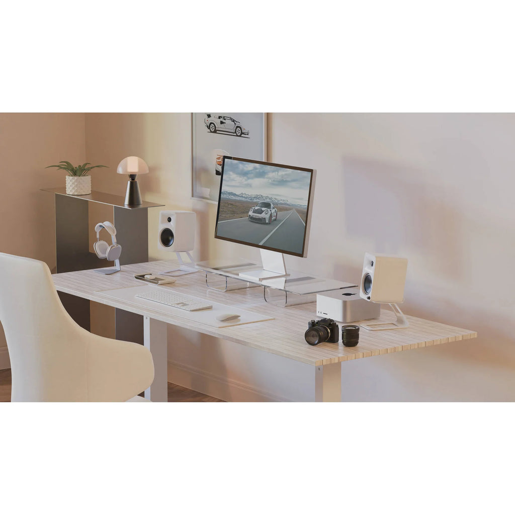 Kanto Audio Ora 4 desktop speakers in black, showing sleek design and compact size for high-quality audio playback.