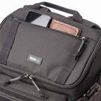 Think Tank DarkLight video equipment bag with padded compartments and adjustable straps for professional camera gear storage.