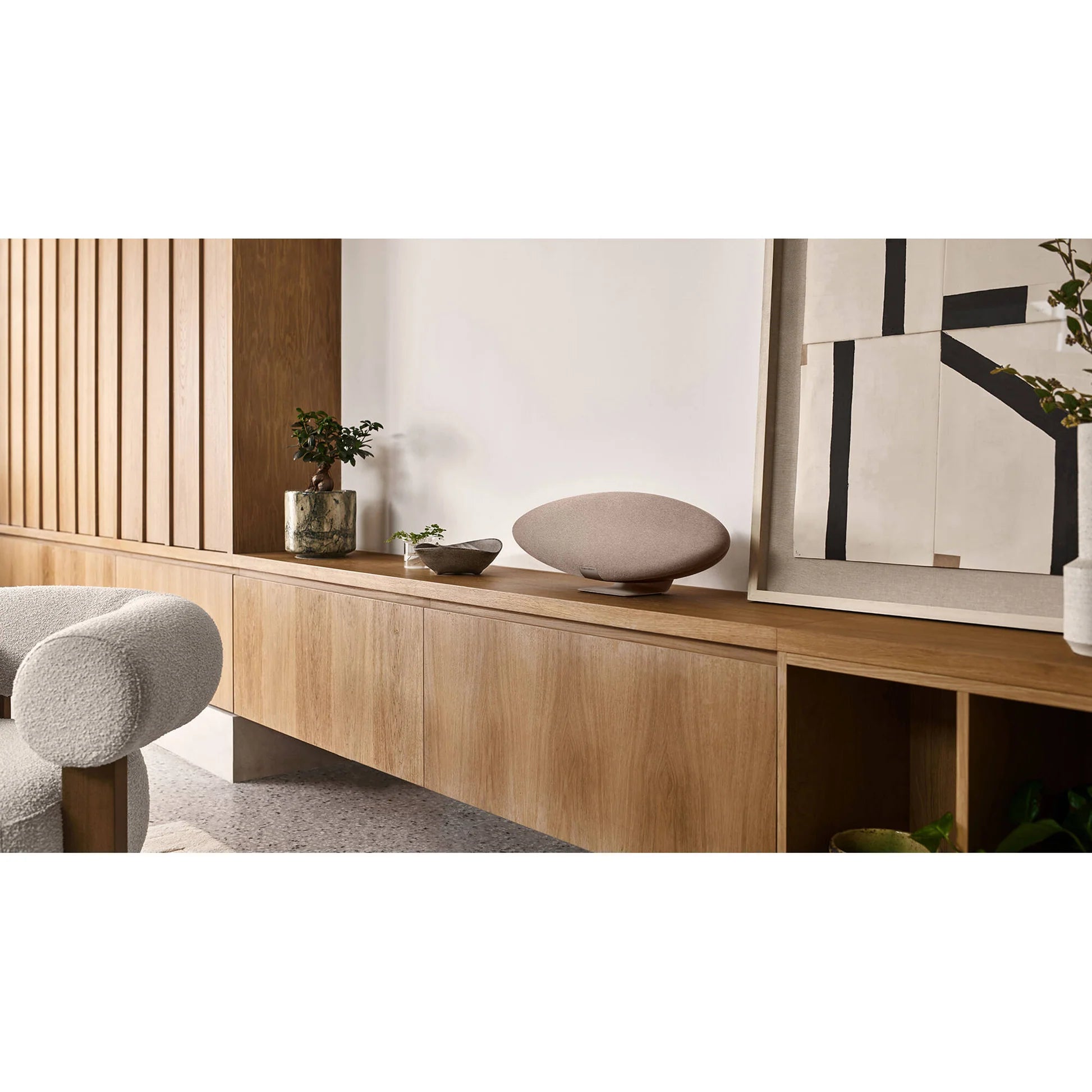 Bowers & Wilkins Zeppelin Pro Edition wireless speaker with sleek black design and modern controls on top.