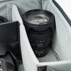 Think Tank Walker Pro Series backpack for video equipment, showing durable black camera gear bag with multiple compartments.