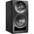 Kali Audio SM-8 active nearfield monitors shown on a desk with audio equipment and cables in a studio setting.