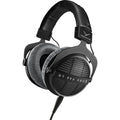 Beyerdynamic DT 990 Pro X studio headphones with over-ear design, open-back ear cups, and adjustable headband.