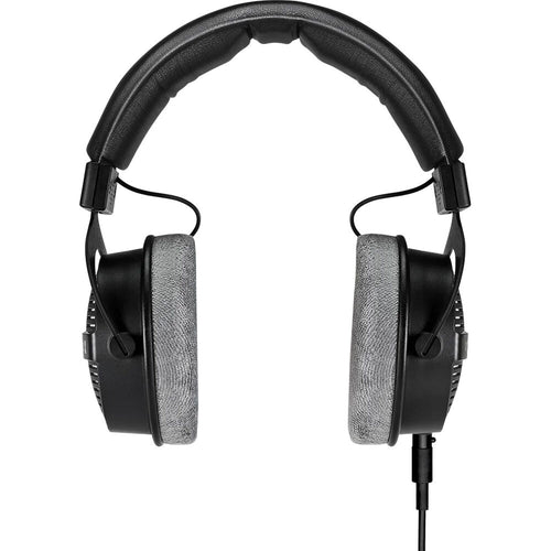 Beyerdynamic DT 990 Pro X studio headphones with over-ear design and open-back ear cups, black color, on a white background.