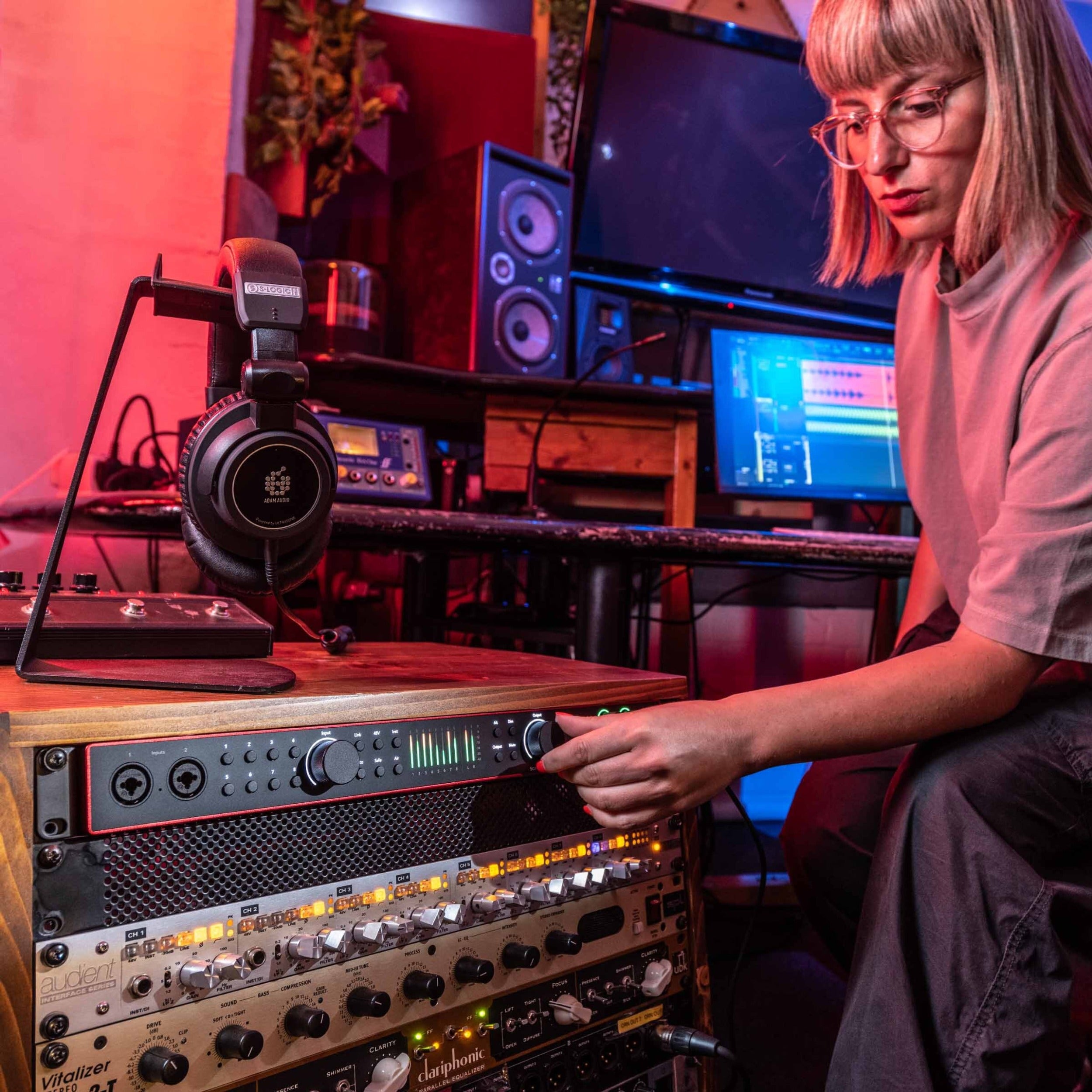 Focusrite Scarlett 18i20 4th Gen audio interface with multiple input and output ports, USB connection, and control knobs.