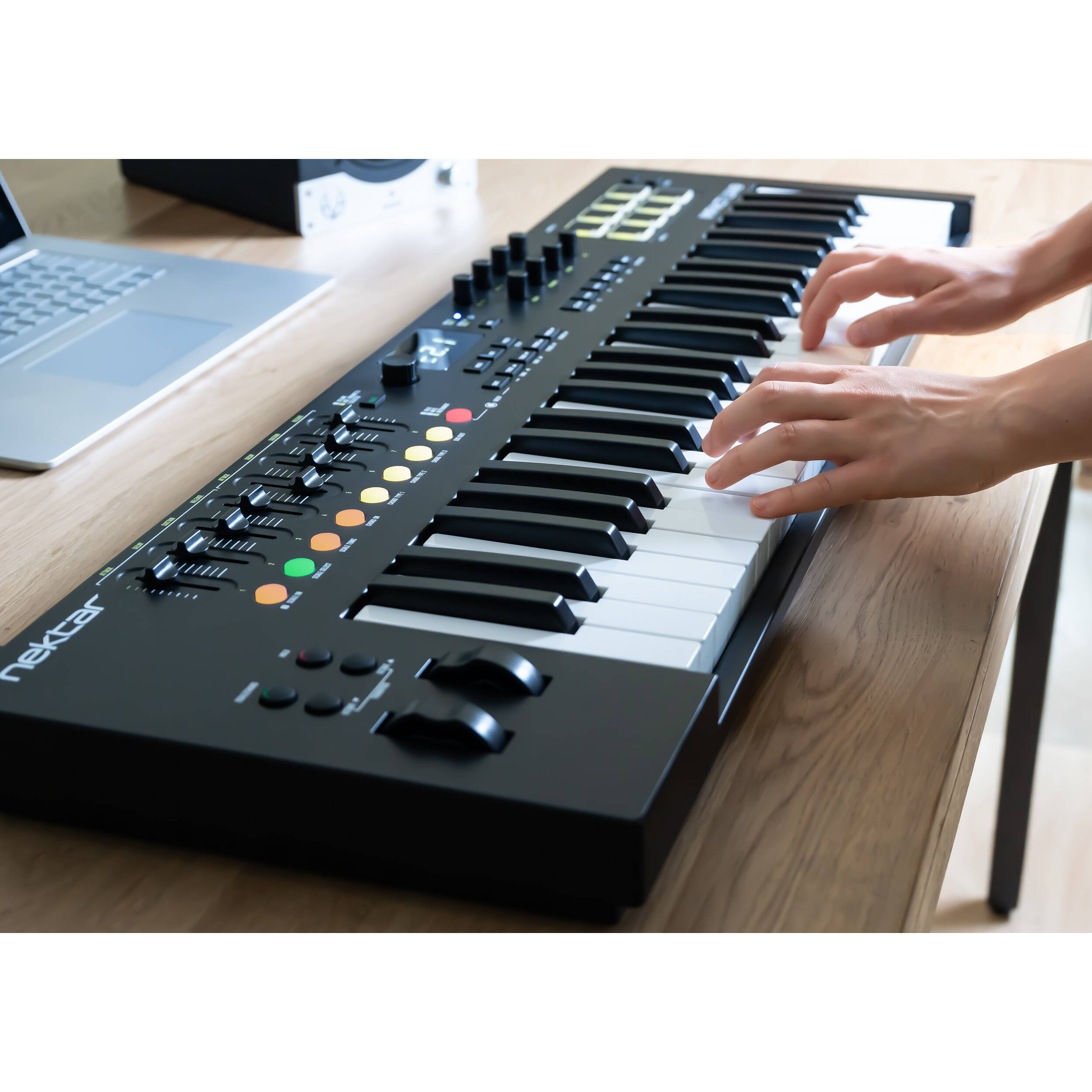 Nektar Impact LX49 MK3 MIDI keyboard with 49 keys, control knobs, and pads, designed for music production and performance.