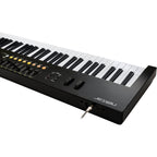 Nektar Impact LX88 MK3 MIDI keyboard with 88 keys, control knobs, and pads for music production and performance.