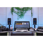 IK Multimedia iLoud Precision 5 MK2 active nearfield monitors showing front view with control knobs and speaker grille.