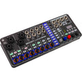 Zoom LiveTrak L6max digital mixer with multiple input channels, knobs, and display screen for professional audio mixing.