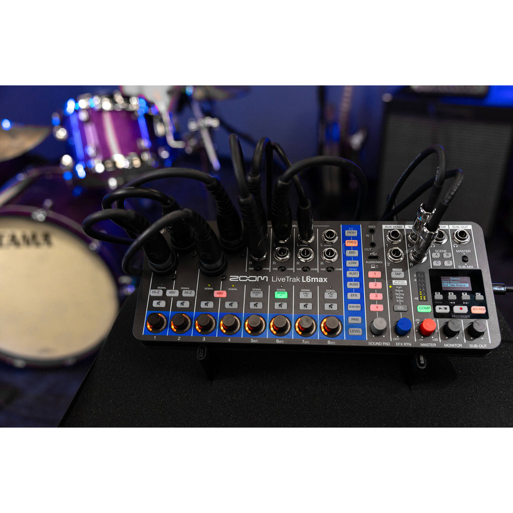 Zoom LiveTrak L6max digital mixer with multiple input channels, knobs, and display screen for professional audio mixing.