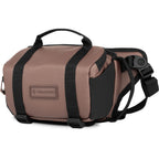 Wandrd Rogue Sling video equipment bag with adjustable strap and multiple compartments for camera gear and accessories.