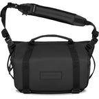 Wandrd Rogue Sling camera bag with adjustable strap and multiple compartments for video equipment storage.