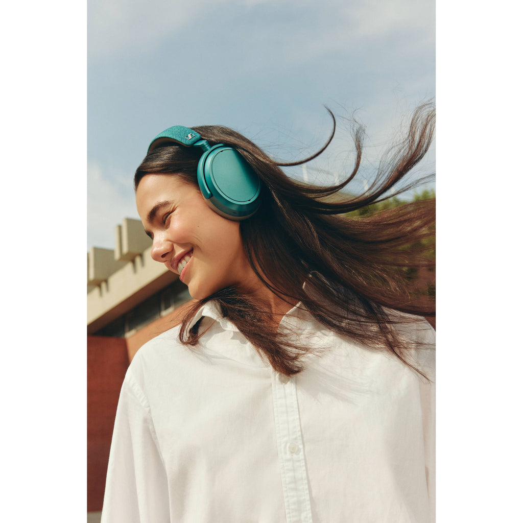 Sennheiser Momentum 4 Wireless headphones with over-ear design, black color, and padded ear cushions for immersive sound.