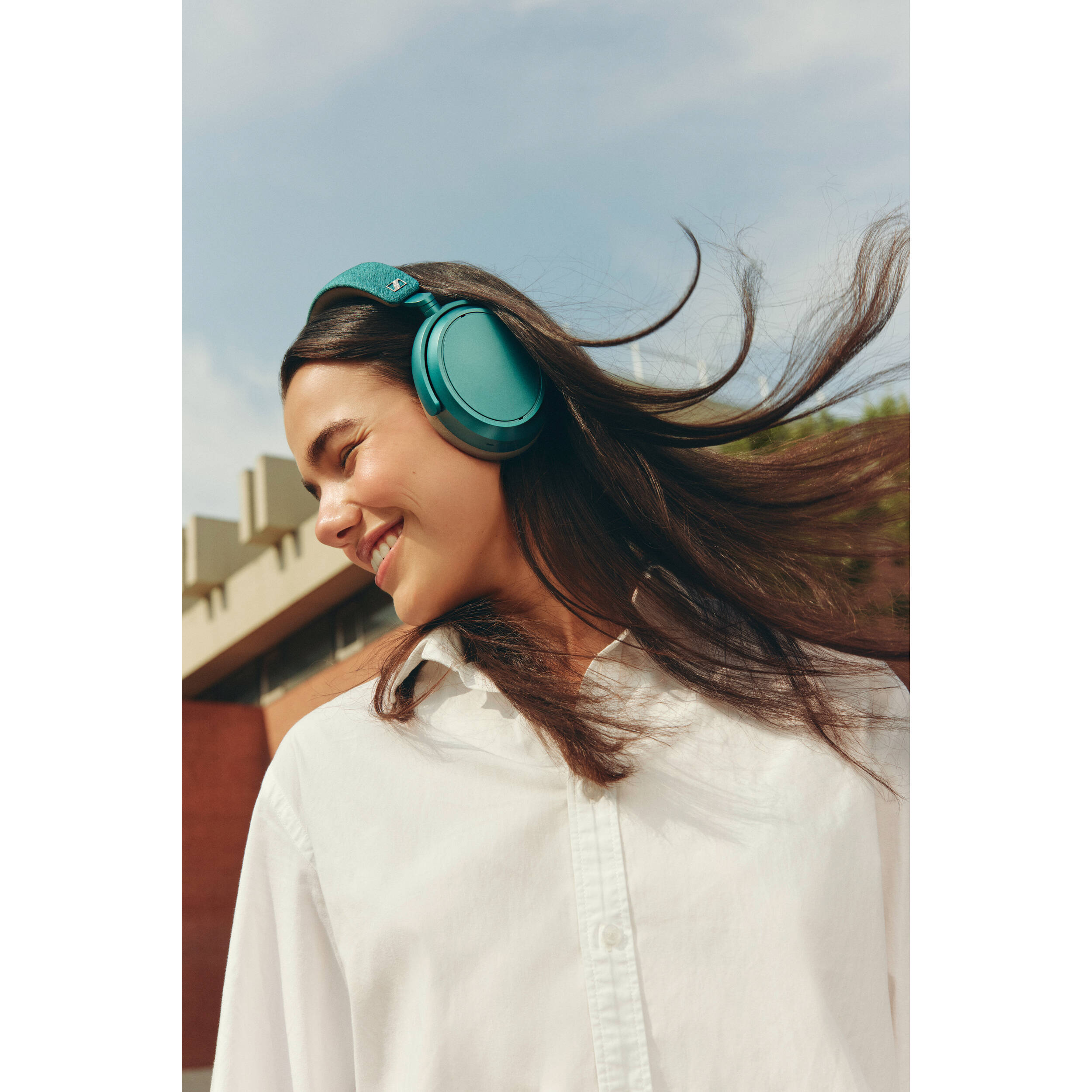 Sennheiser Momentum 4 Wireless headphones with over-ear design, black color, and padded ear cushions for immersive sound.