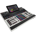Akai Professional MPC XL drum machine and sampler with large pads, control knobs, and a display screen for music production.