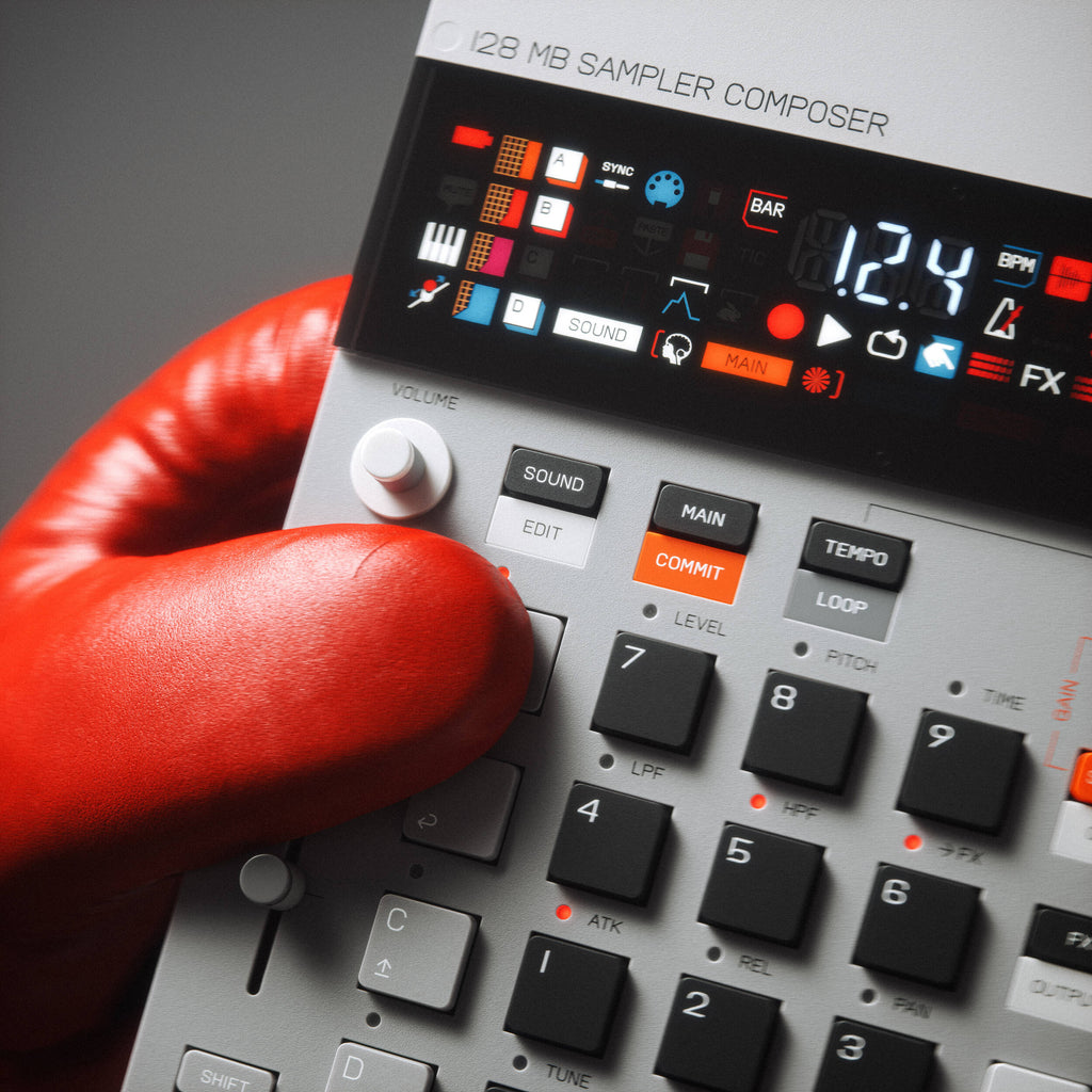 Teenage Engineering EP-133 K.O. II drum machine and sampler with colorful interface and control knobs.