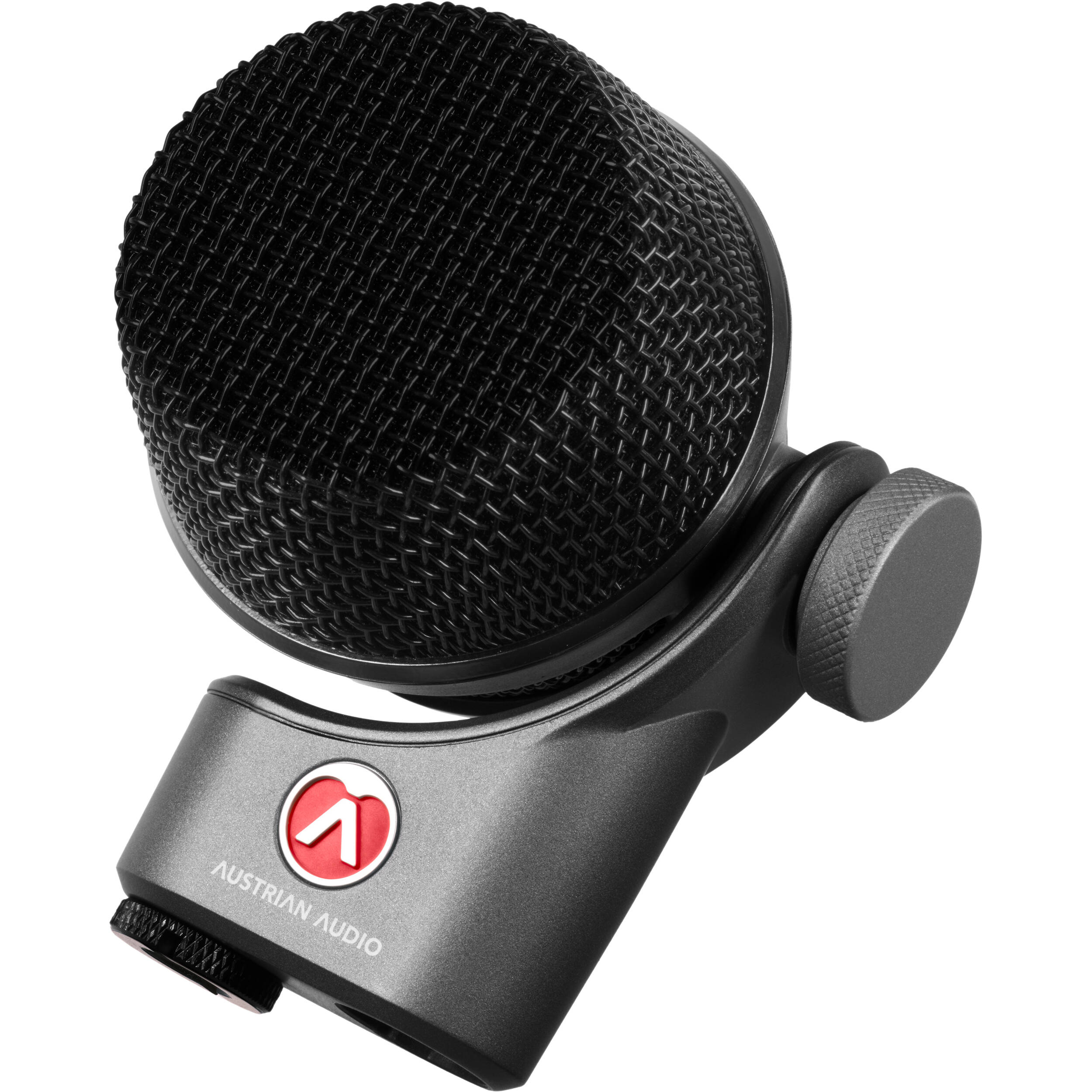 Austrian Audio OC-B6 condenser microphone with black body and silver grille, positioned on a stand for studio recording.