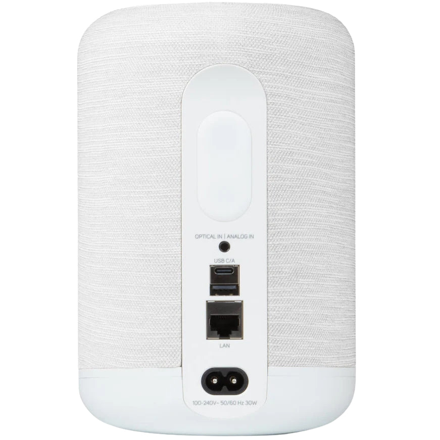 Bluesound Pulse Flex 2025 wireless speaker with sleek black design, compact shape, and touch controls on the top surface.