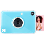 Kodak Printomatic+ instant compact camera with colorful design and lens, ready for quick photo printing.
