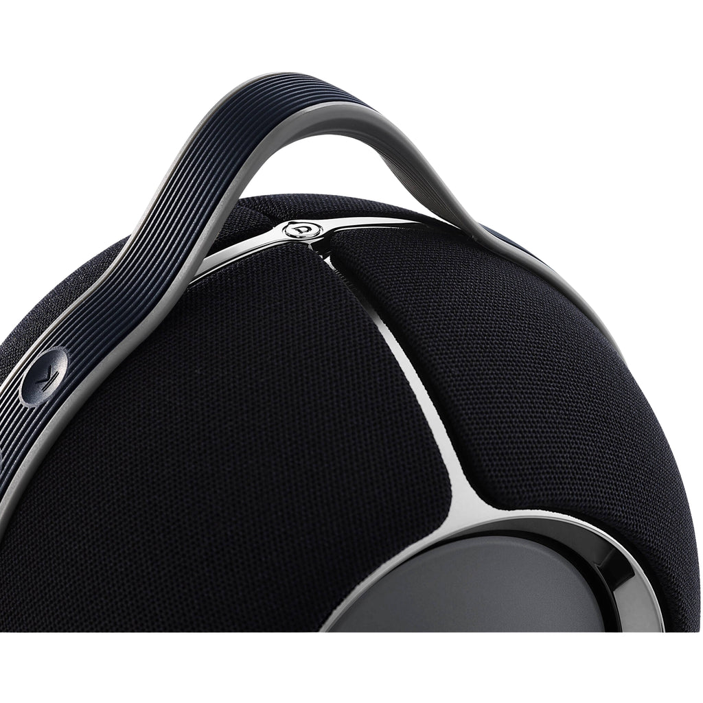 Devialet Mania portable speaker with sleek design and control buttons, showcasing its modern look and compact size.