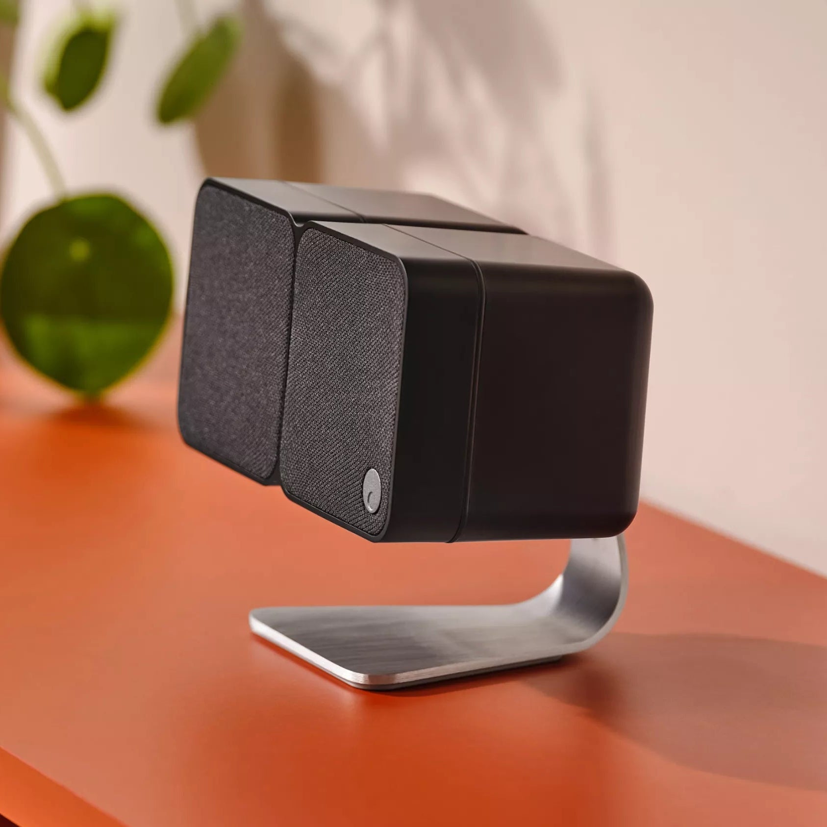 Cambridge Audio MSX 20 speakers showing sleek black design with speaker grille and control buttons on top