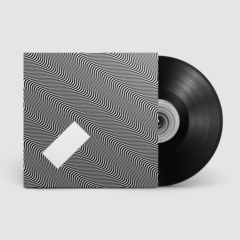 Black vinyl LP of Jamie XX's "In Waves" by Young, showcasing the album cover art on the front.