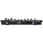 Arturia DrumBrute Impact drum machine with colorful pads and knobs for creating electronic drum patterns.