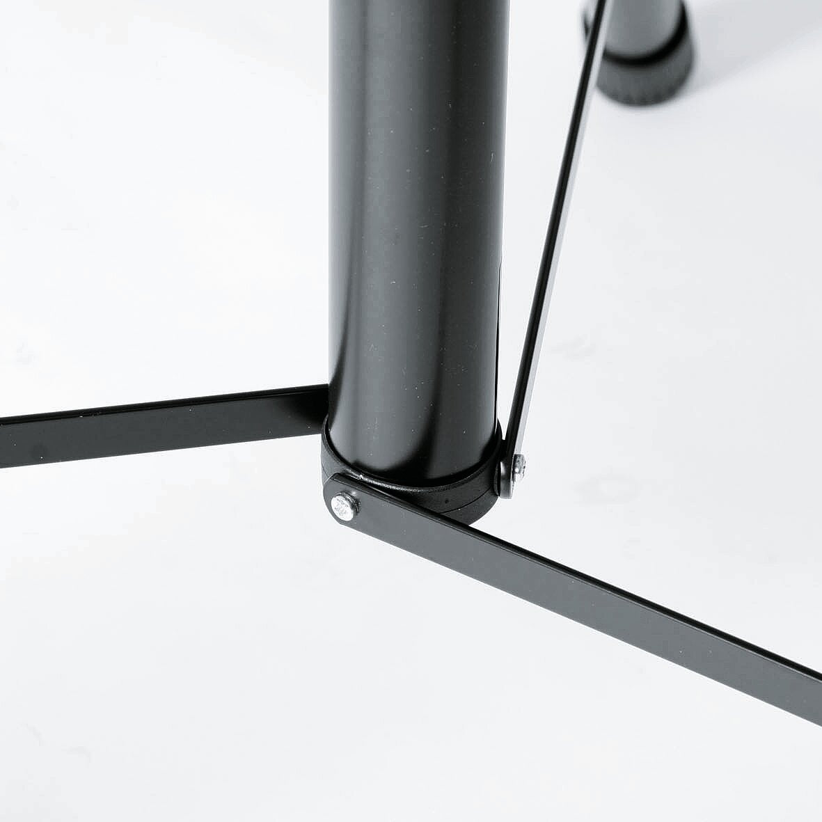 K&M 21435 PA speaker stand with adjustable height and sturdy metal construction, designed for professional audio setups.