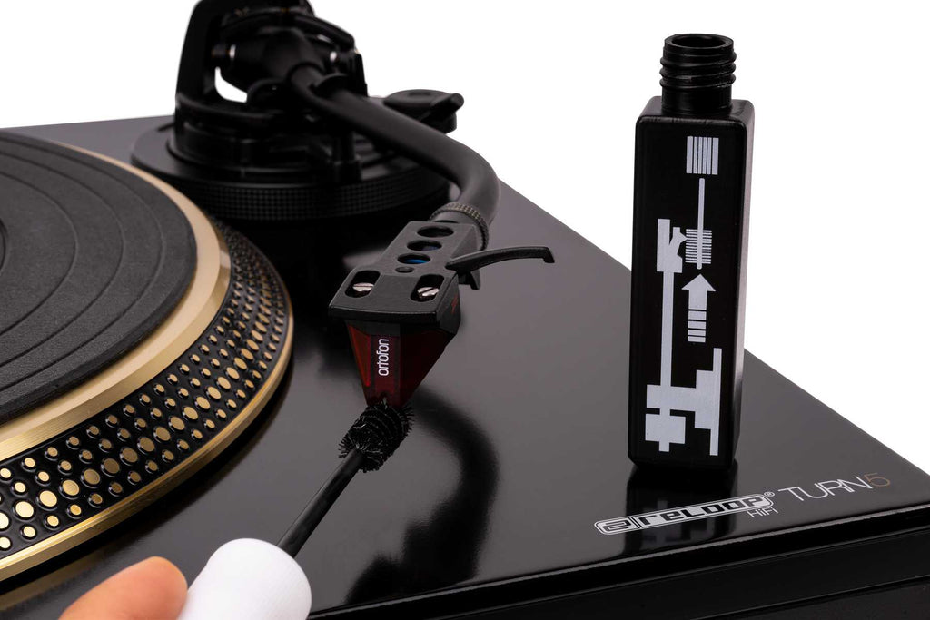 Reloop turntable cartridge mount and gauge set for precise cartridge installation and alignment on DJ turntables.