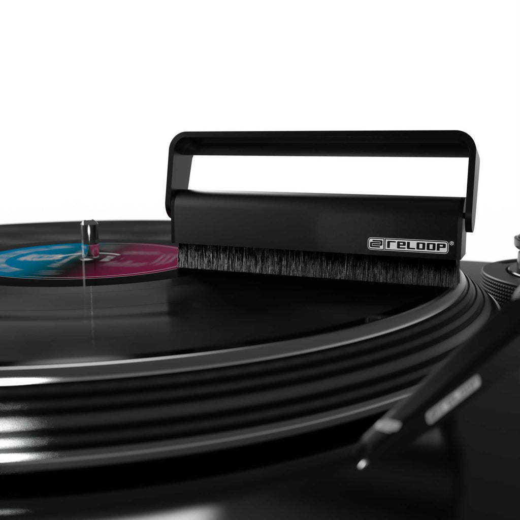 Reloop Premium Carbon Fibre Record Brush for cleaning vinyl records, featuring a sleek black design and soft bristles.