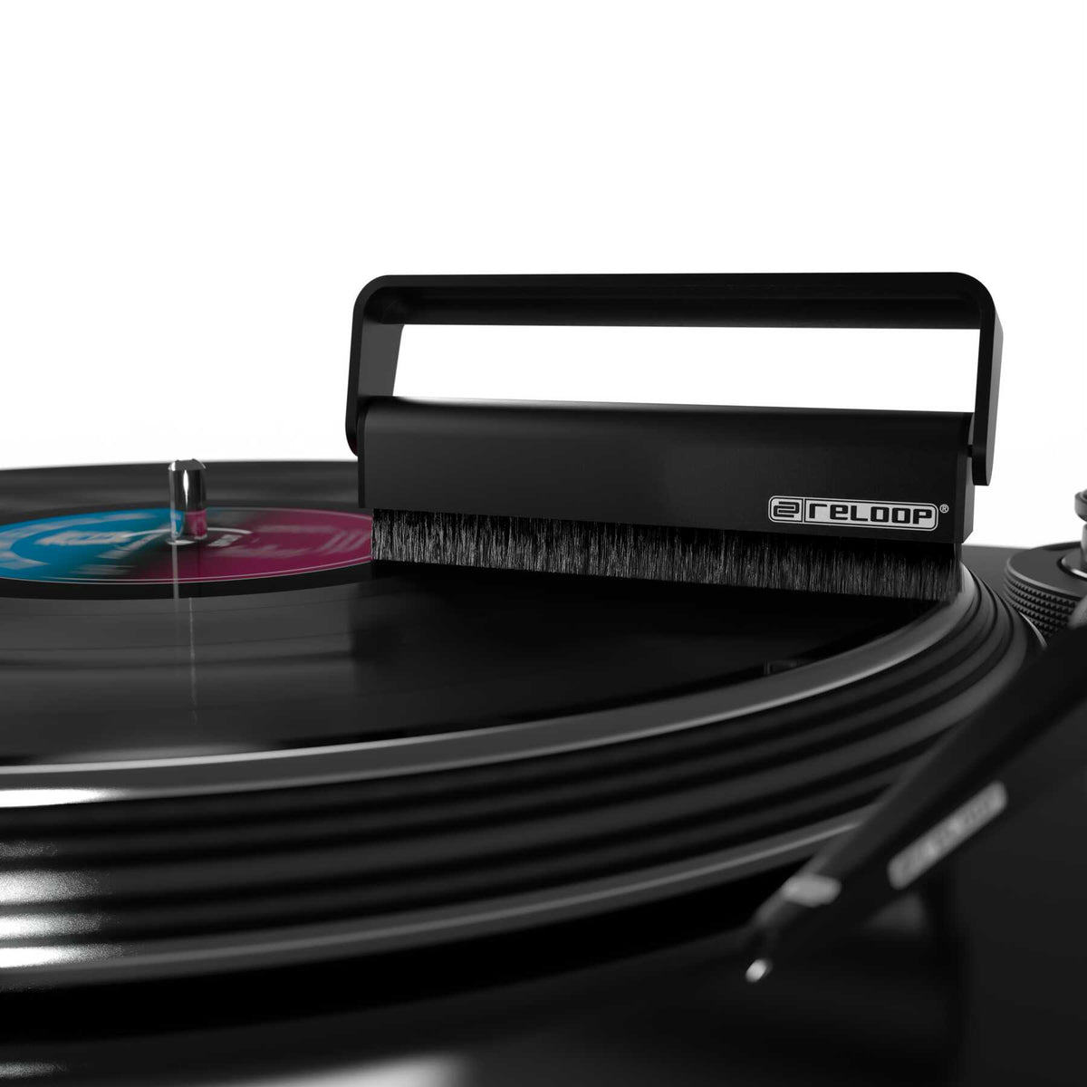 Reloop Premium Carbon Fibre Record Brush for cleaning vinyl records, featuring a sleek black design and soft bristles.