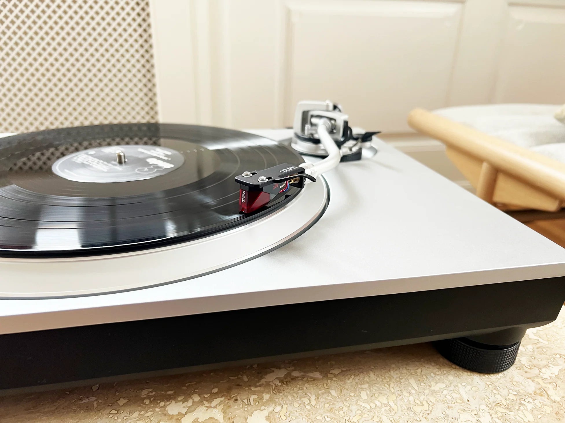 Ortofon 2M Red turntable cartridge with stylus mounted, designed for high-quality vinyl playback on turntables.