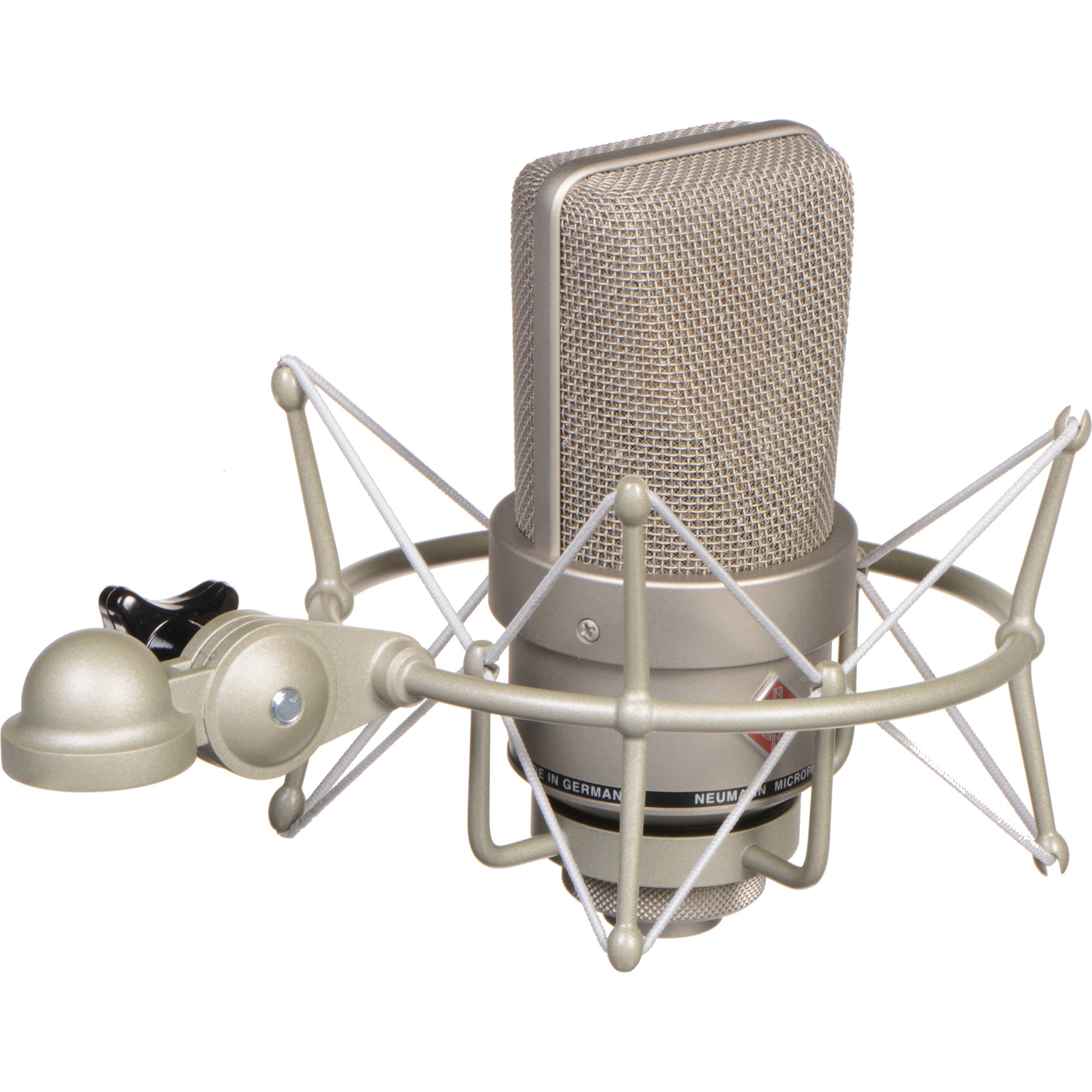 Neumann TLM 103 studio condenser microphone set with microphone, shock mount, and accessories on a professional recording desk