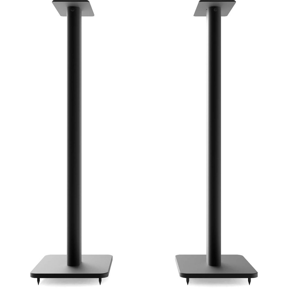 Kanto Audio SP32 32-inch speaker stands supporting audio speakers on a flat surface with a stable base.
