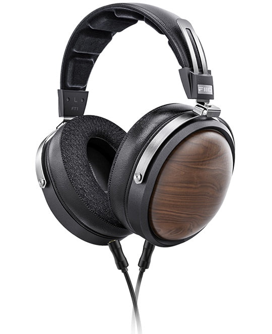 FiiO FT1 wired headphones with black ear cups and inline remote, designed for high-quality audio listening.