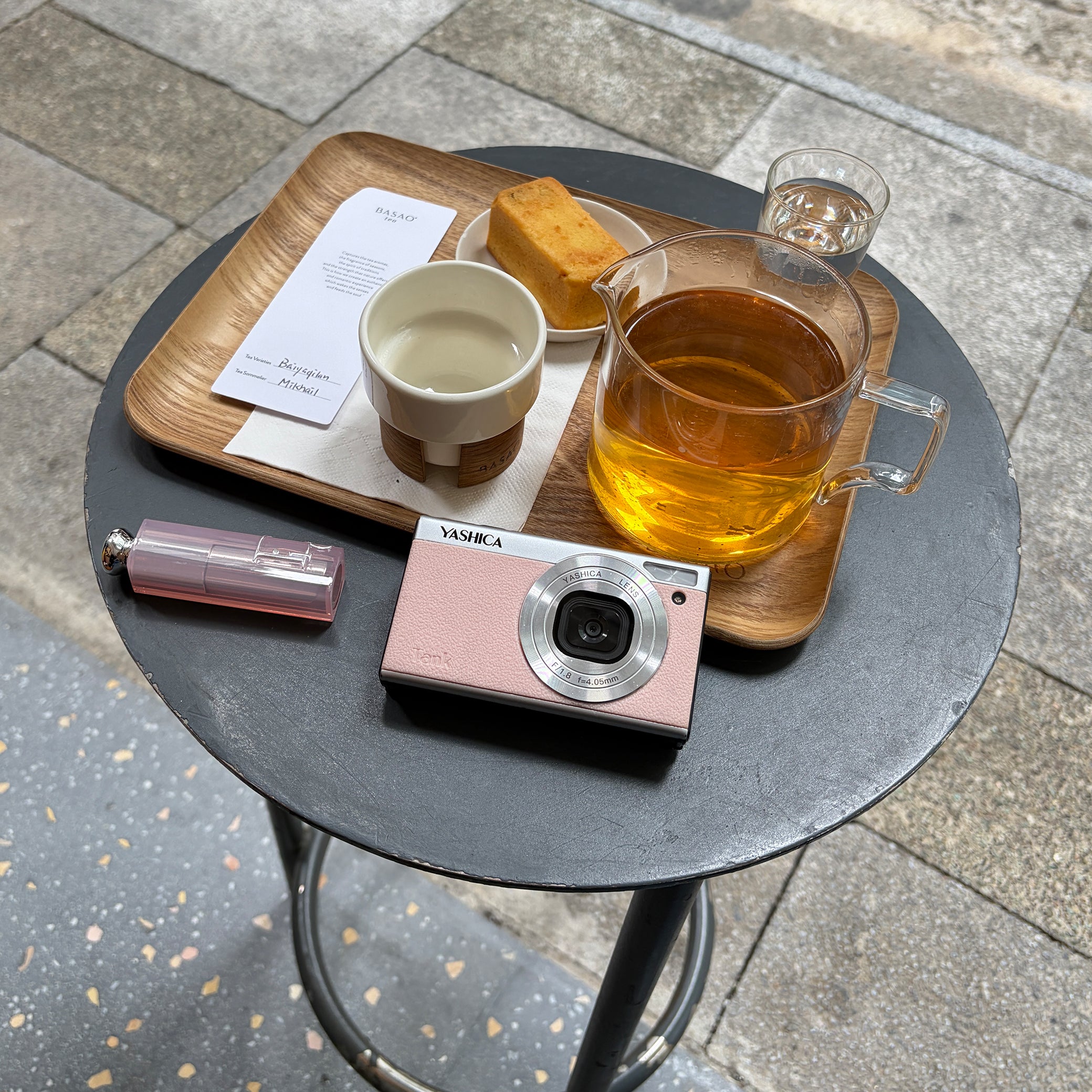 Yashica Tank instant and compact camera with black body, showcasing its lens and viewfinder for easy photography.