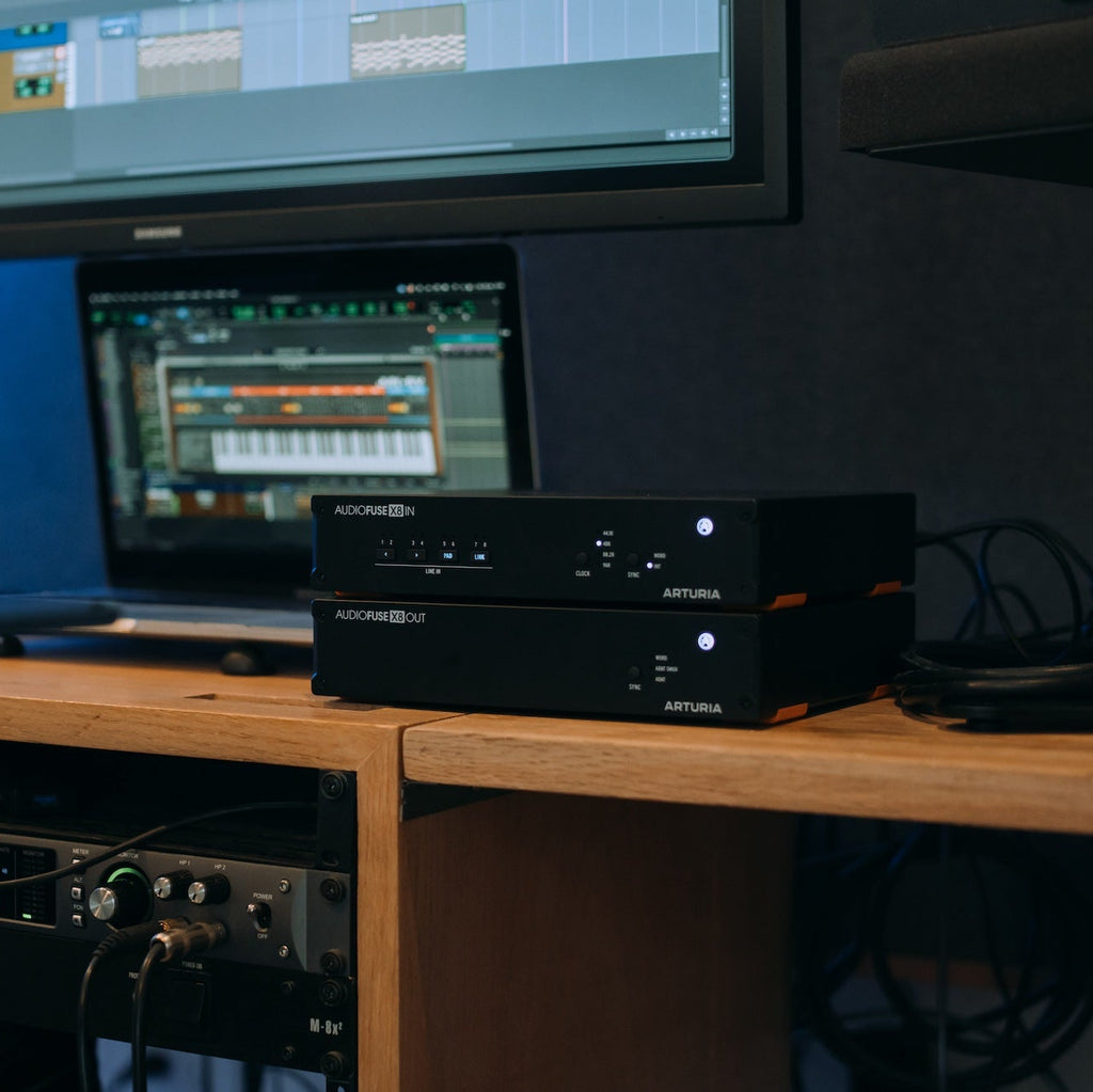 Arturia AudioFuse X8 audio interface with multiple input and output ports, professional-grade design, and control knobs.