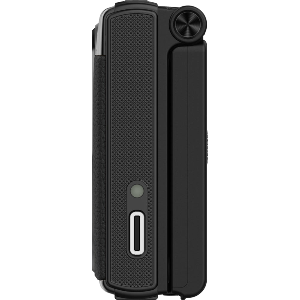 Yashica Tank instant and compact camera with silver body and retro design, showcasing the camera's front view.