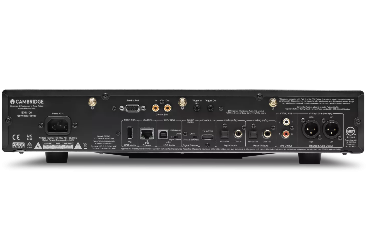 Cambridge Audio EXN100 music streamer showing front panel with display and control buttons, connected to audio equipment.