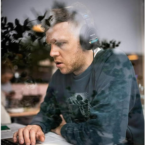 Sony MDR-7506 studio headphones with over-ear design, black color, and padded ear cups for professional audio monitoring.