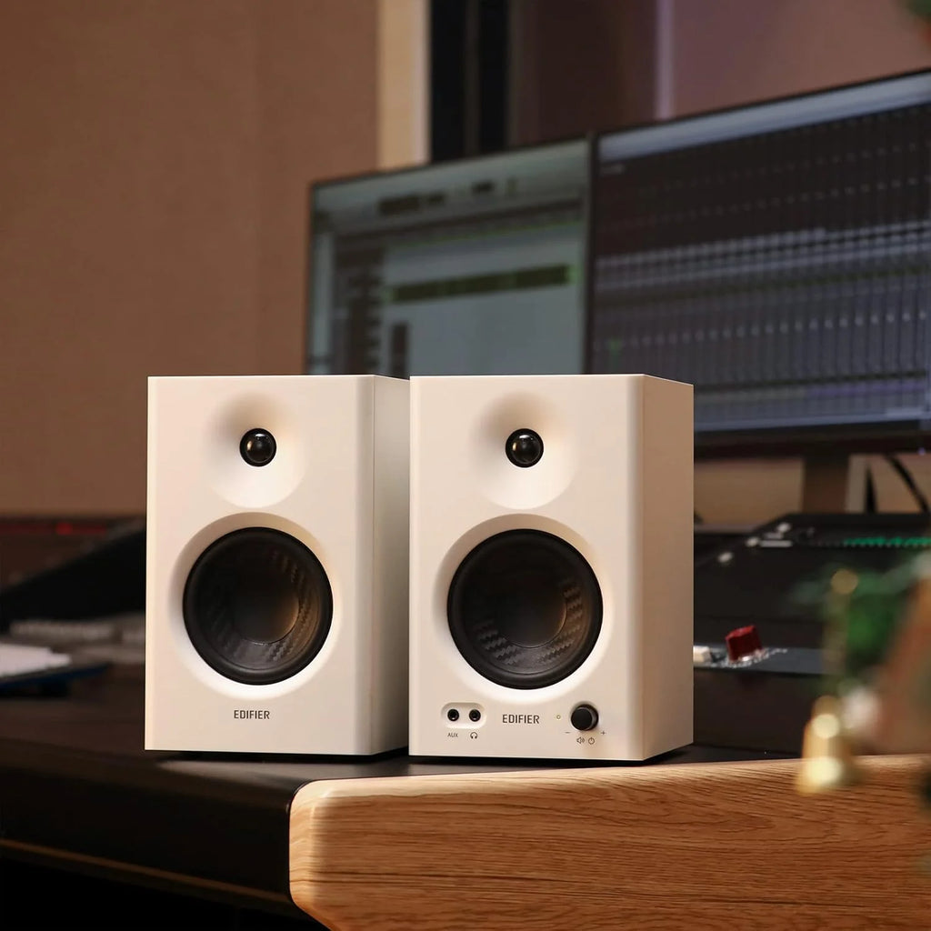 Edifier MR4 desktop speakers with sleek black design and compact size, featuring dual speaker units and modern audio technology.