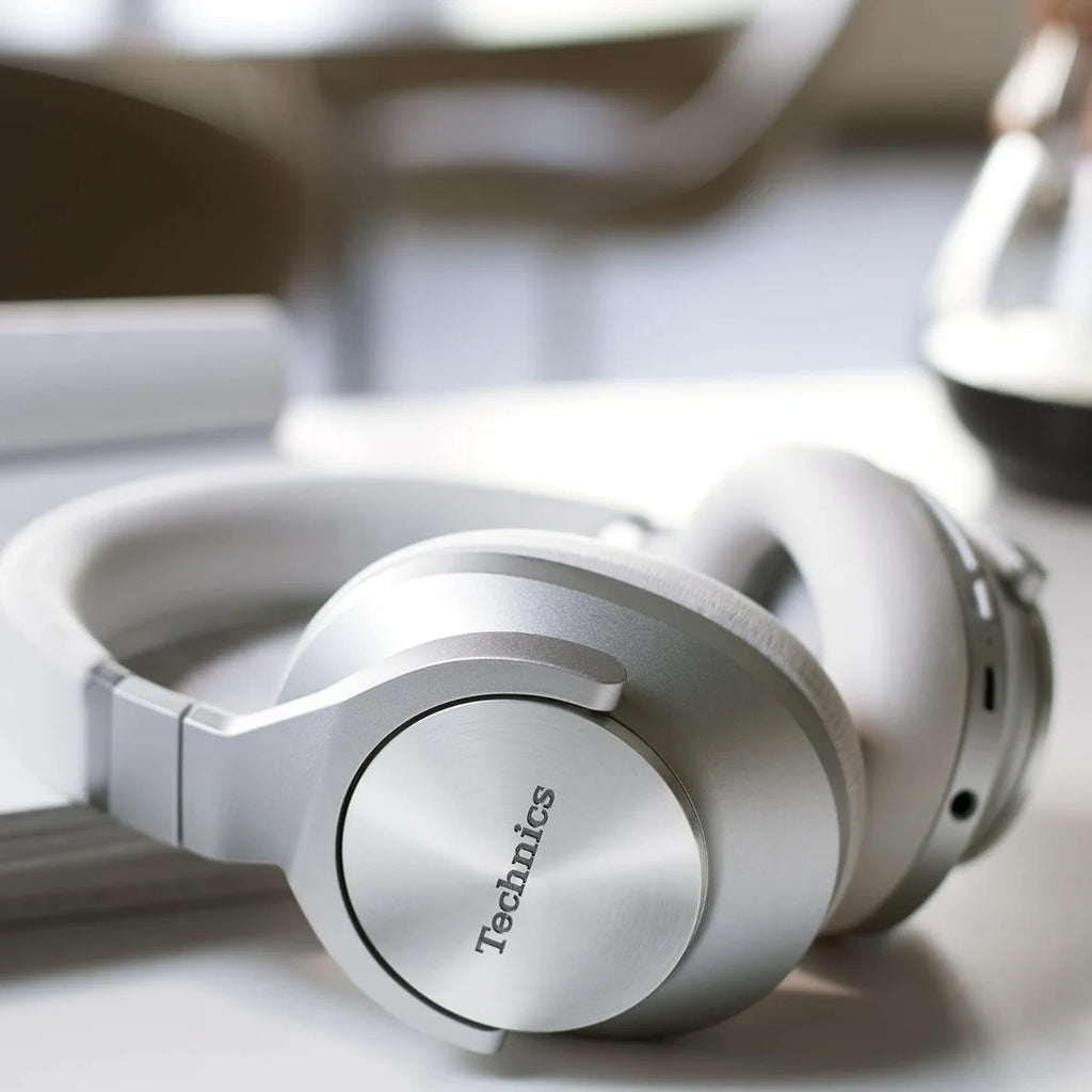 Technics EAH-A800 wireless headphones with over-ear design and sleek black finish, featuring cushioned ear cups for comfort.